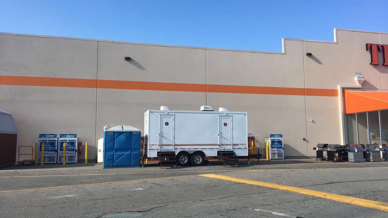 Eight Station Vegas Restroom Trailer, at a Home Depot Remodal, in Miami FL, with an  ADA Portable Toilet