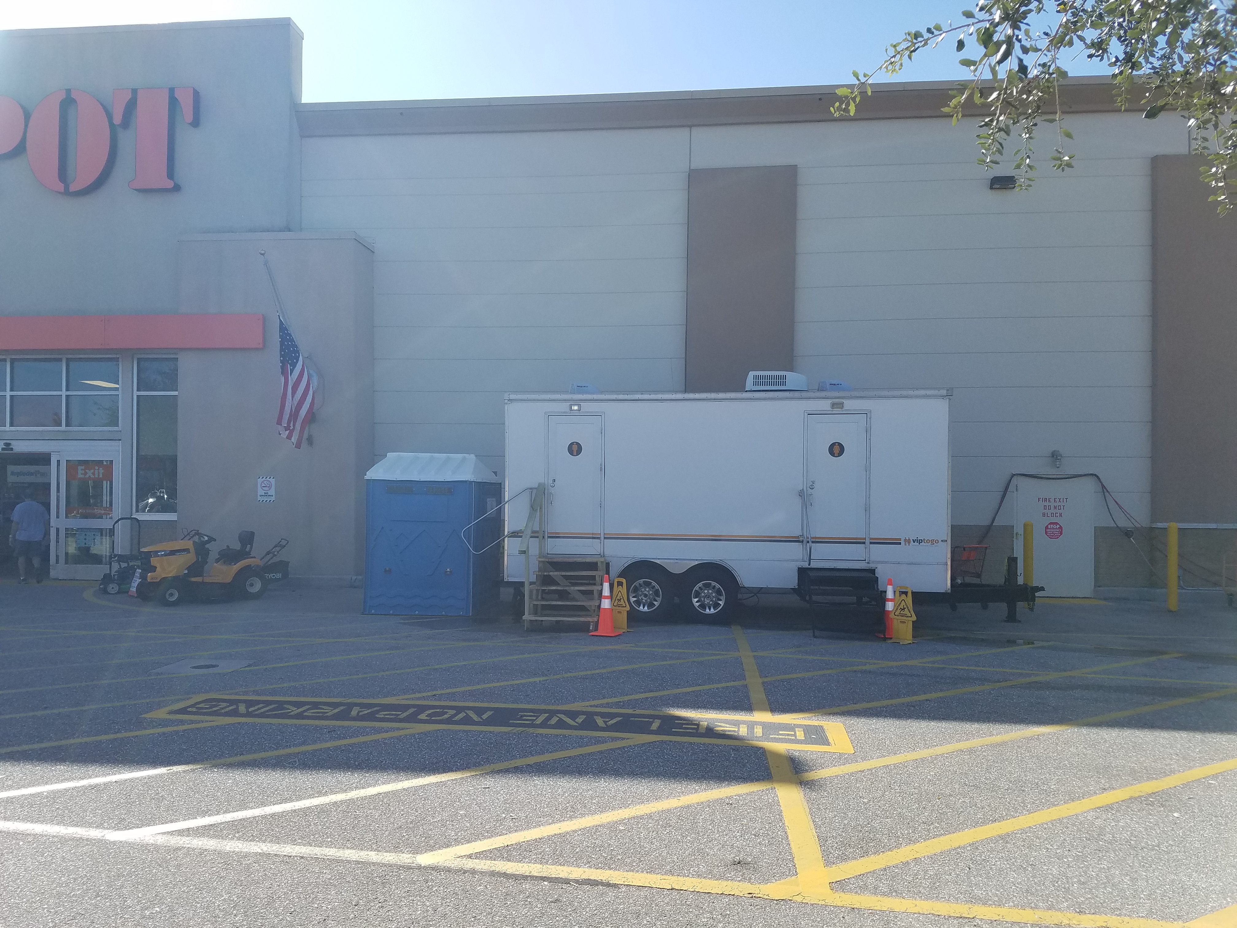 Eight Station Vegas Restroom Trailer, at a Home Depot Remodal, in Scarsdale NY, with an ADA Portable Toilet 