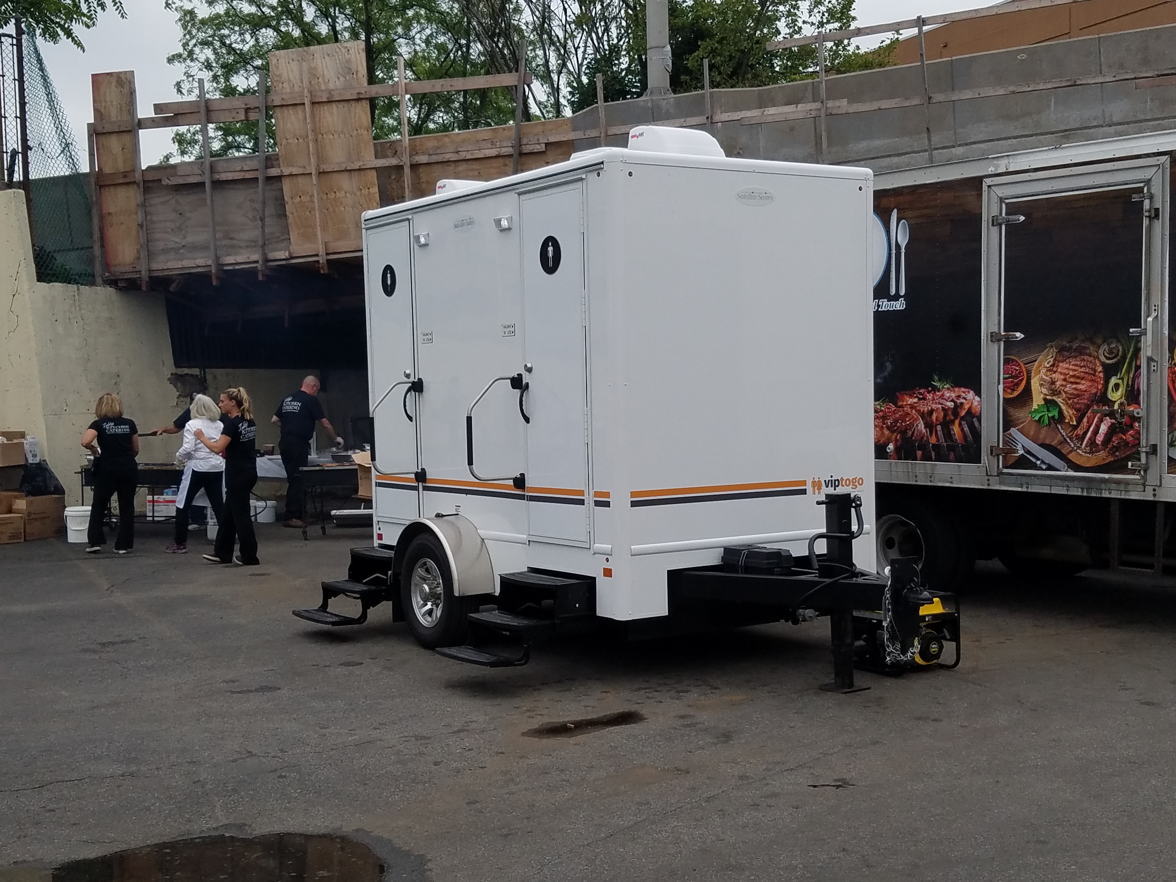 Two Station Rolls Royce Restroom Trailer, at the Yankee Stadium, in Bronx NY, with a Generator 