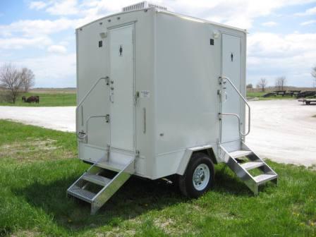 Two Station Stylish Restroom Trailer, at an Outdoor Party
