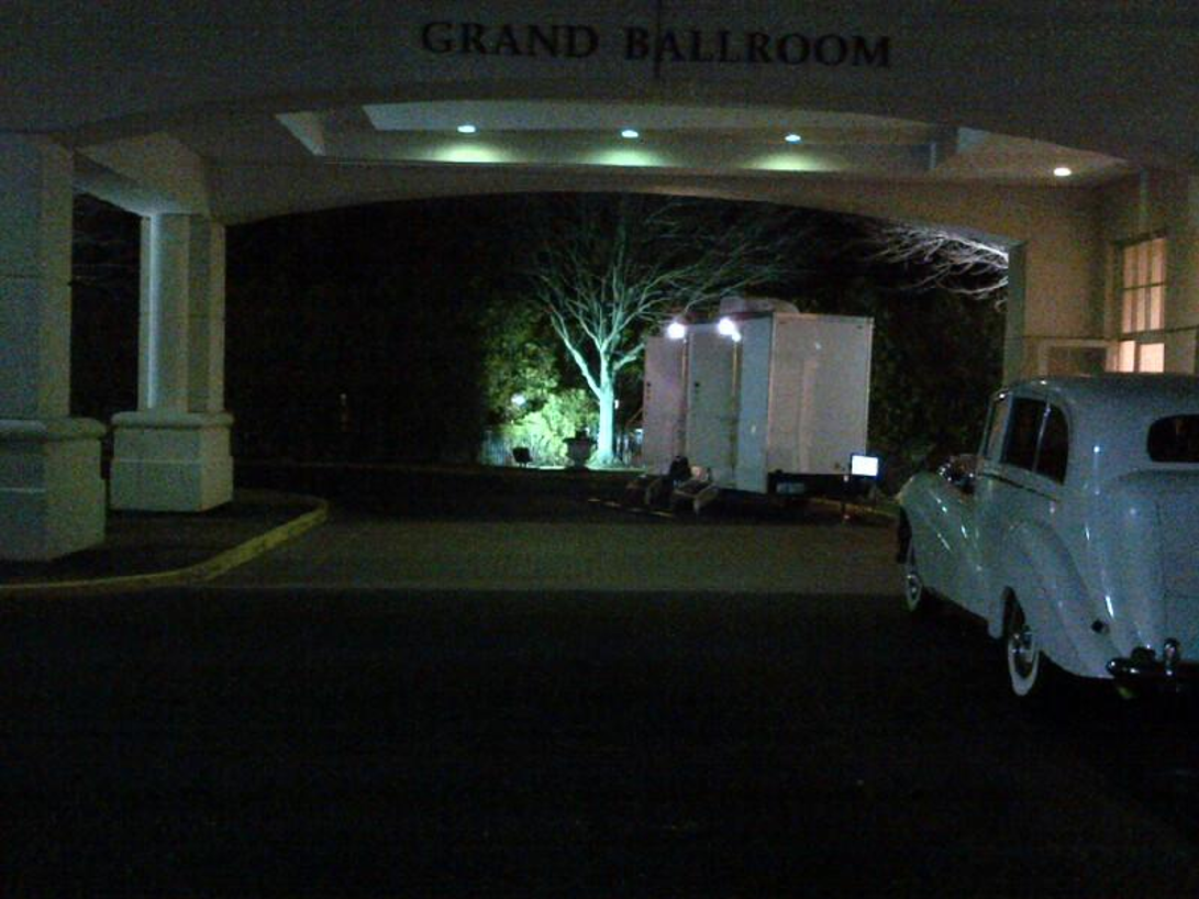 Luxury bathroom rental lit up at Grand Ballroom entryway