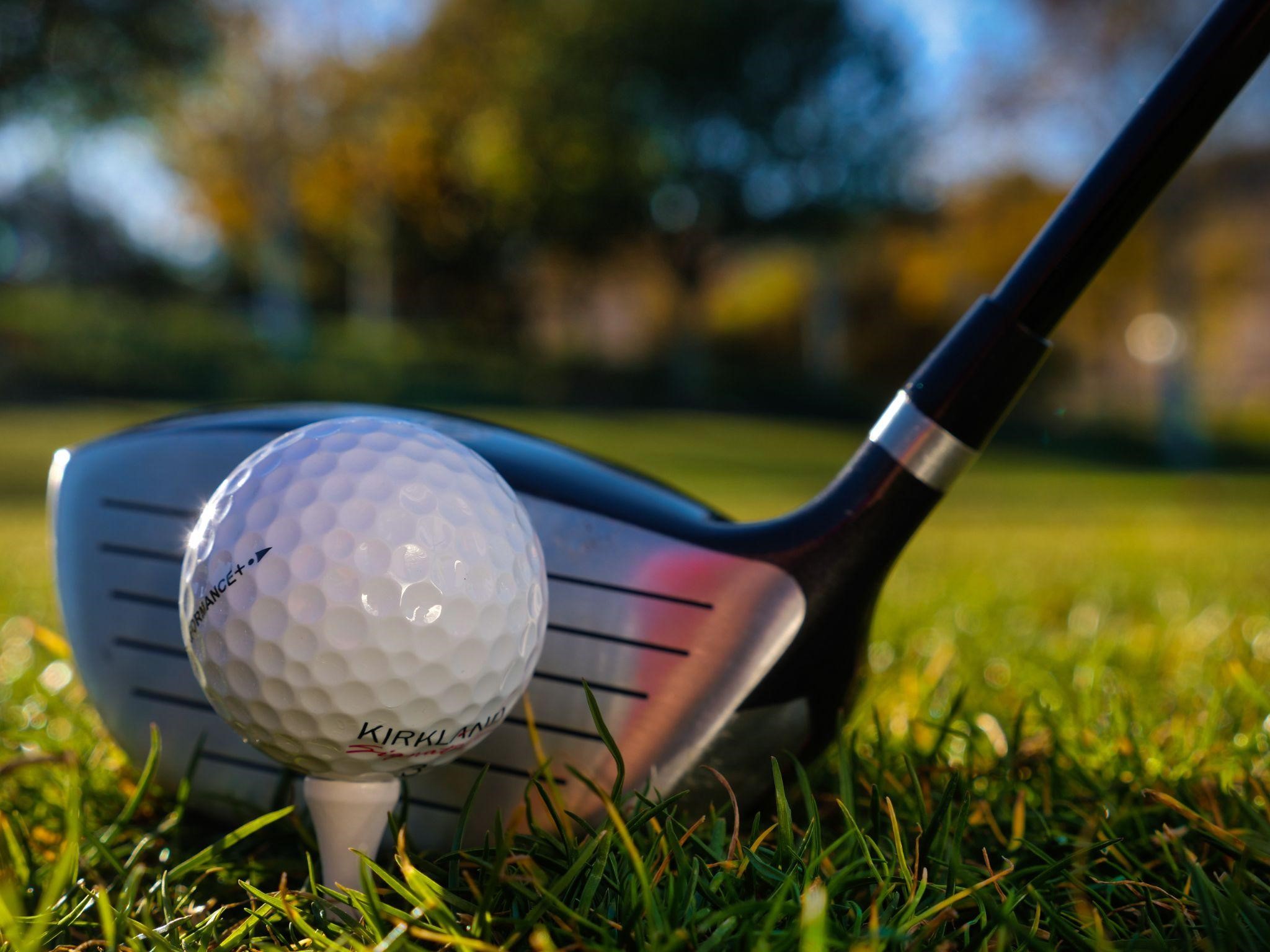 golf player ready to hit ball