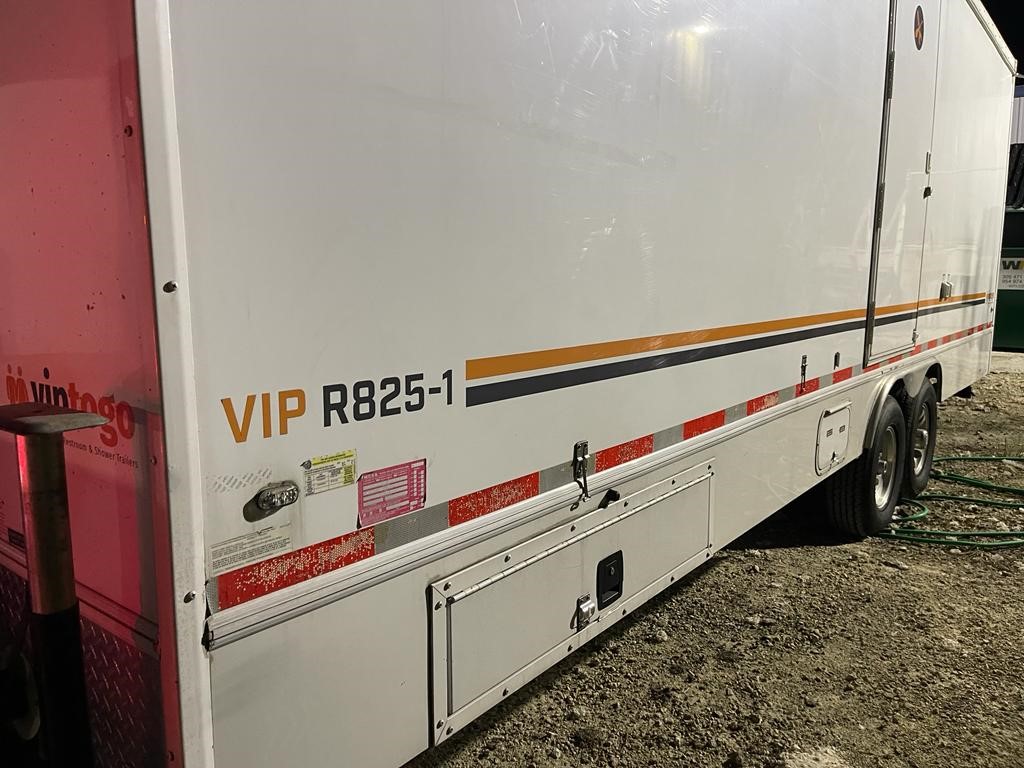 Side view of large unit with bathroom on trailer Side view of large unit with bathroom on trailer