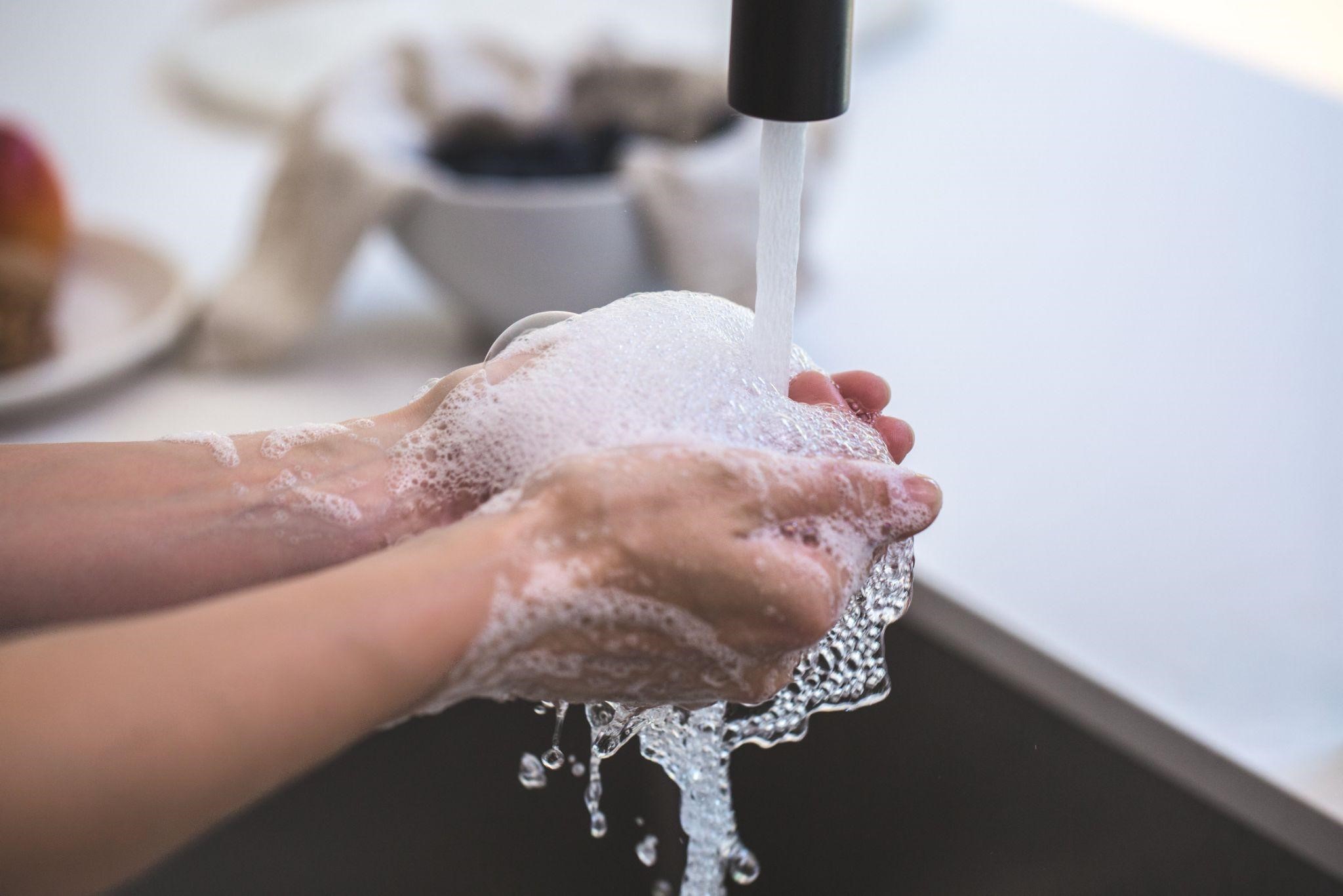 Washing hands with soap and water