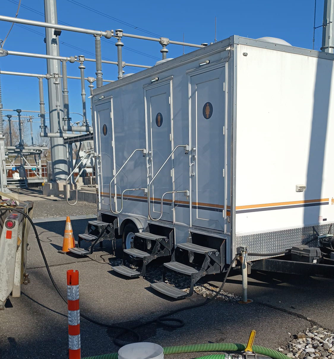 mobile toilet trailer at utility site