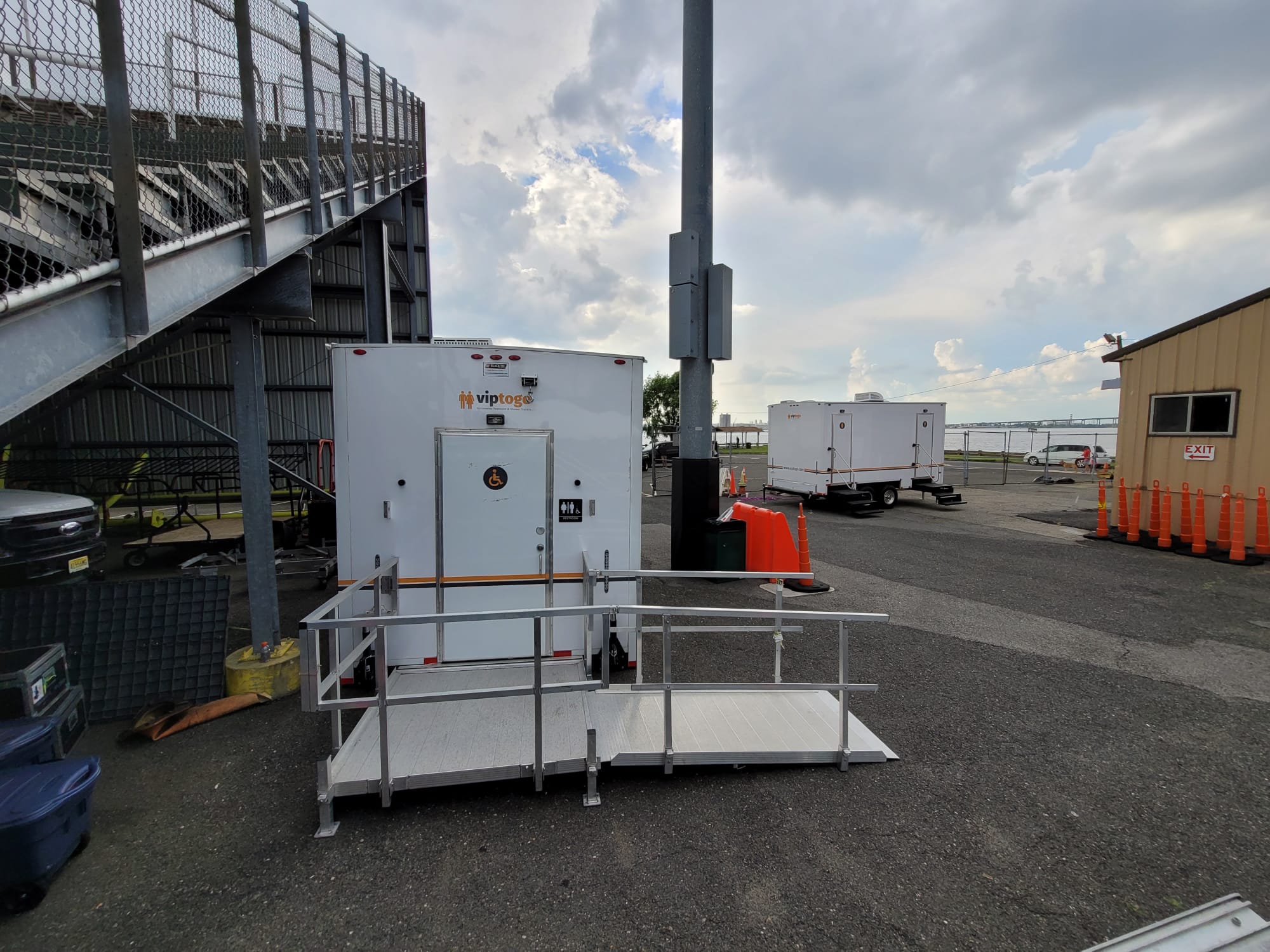 ADA Plus Two Station Restroom Trailer, at a football field