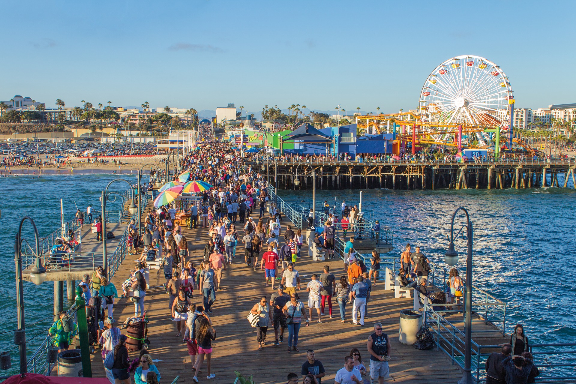 people on beach amusement park