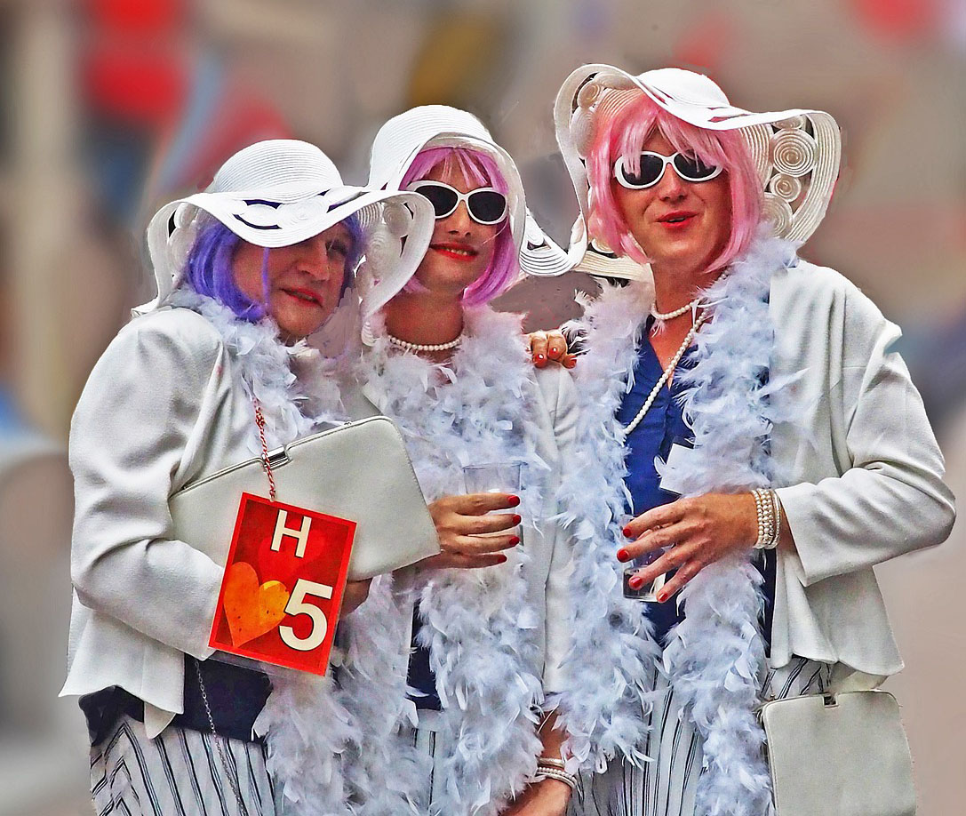 three women dressed up at event three women dressed up at event