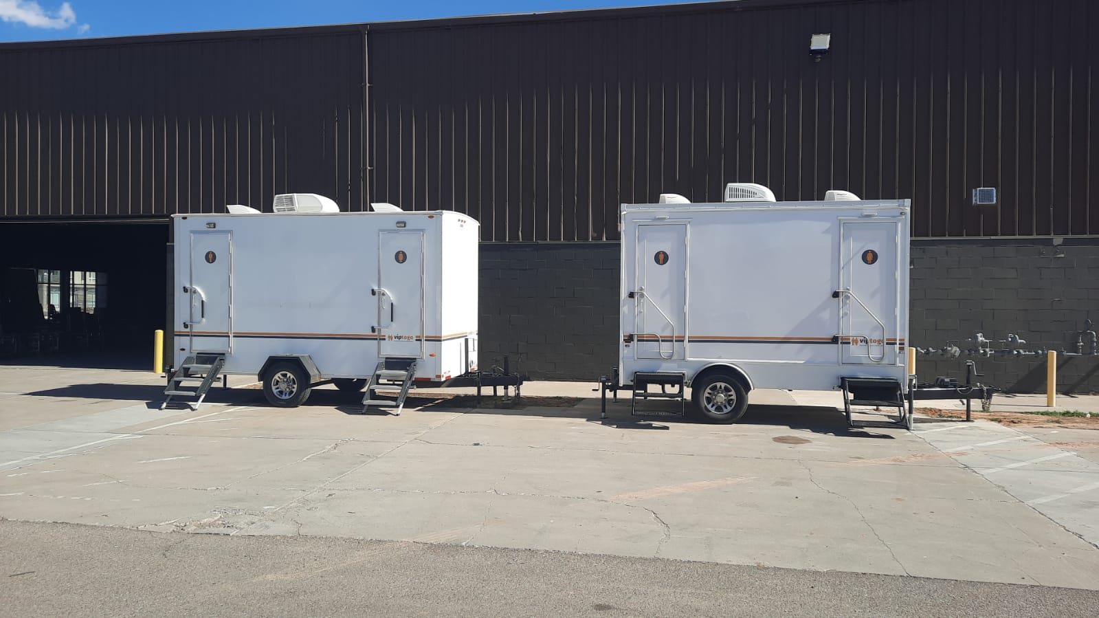 portable toilet trailers parked at a facility portable toilet trailers parked at a facility