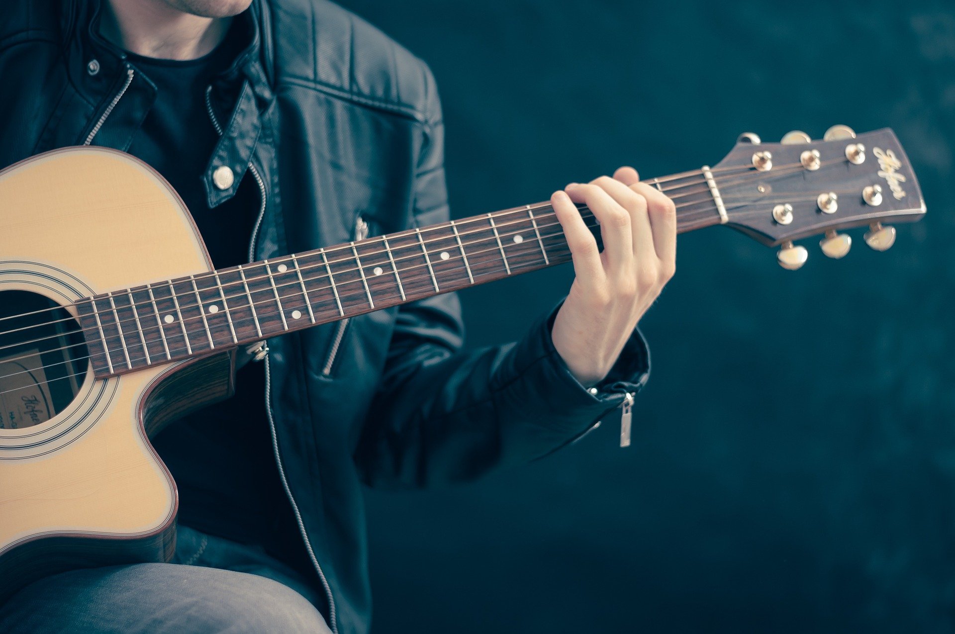 musician playing guitar musician playing guitar