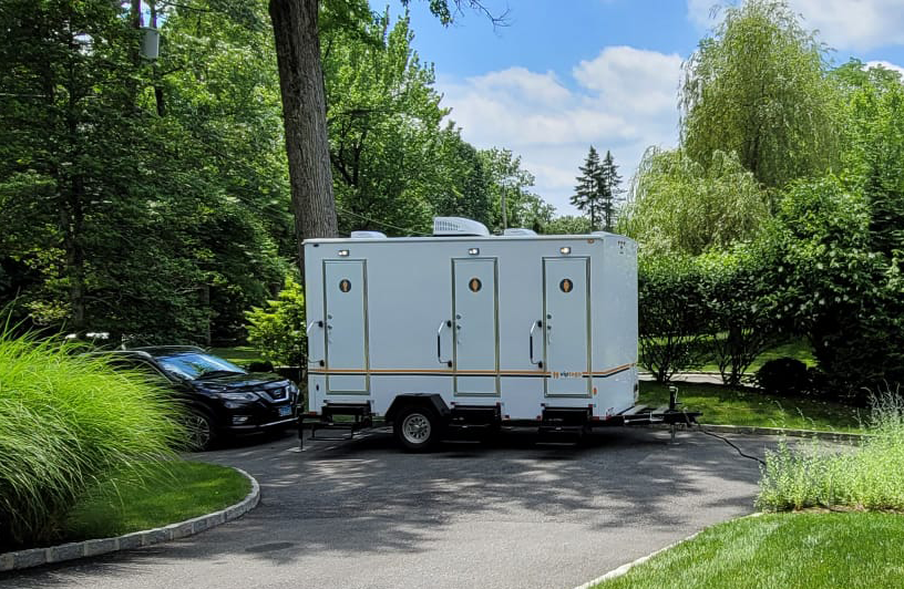 VIP To Go portable restroom trailers at an event
