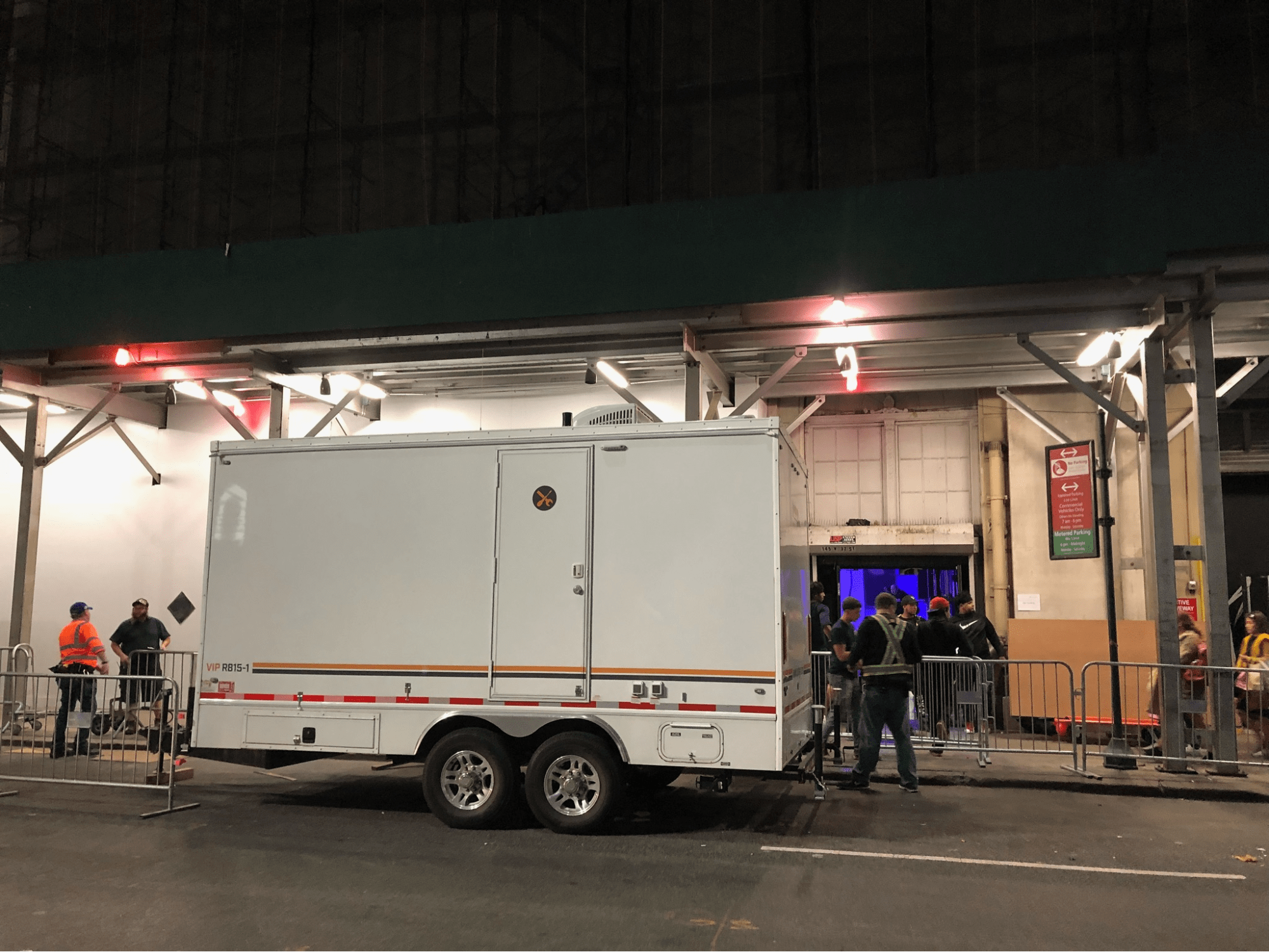 mobile restroom trailers placed at event entrance