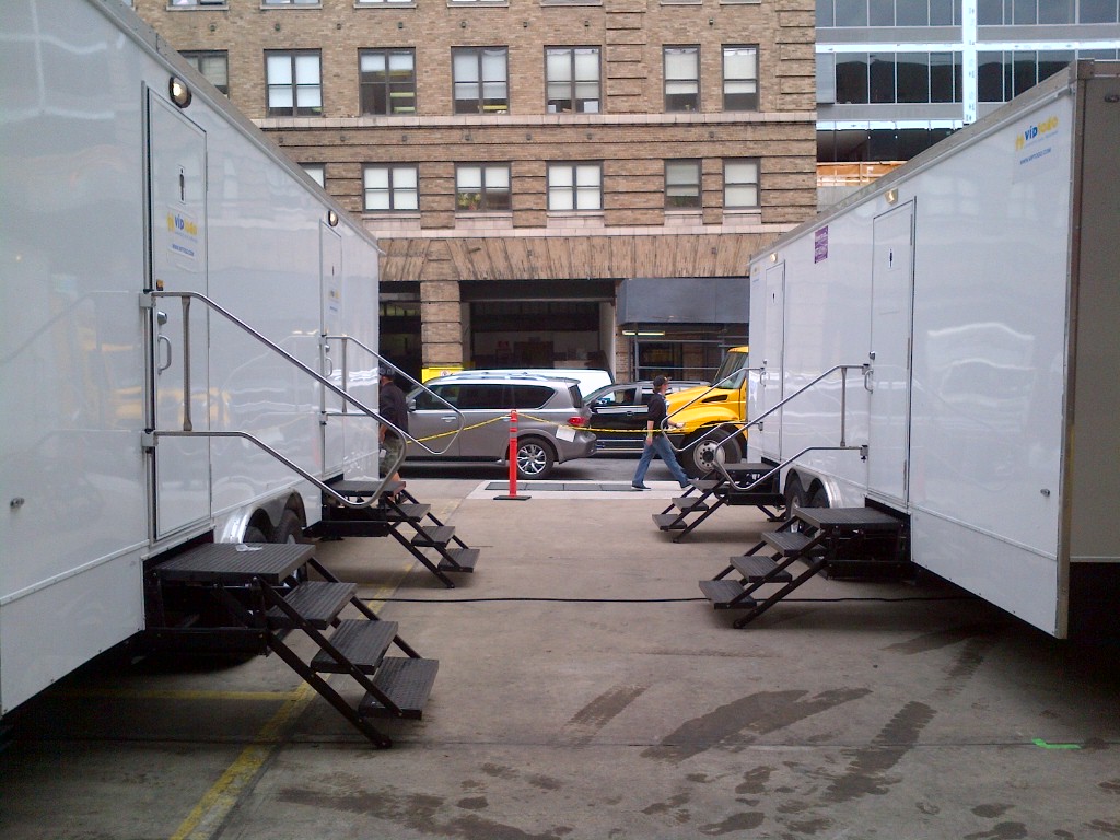 restroom trailers positioned at a nearby event restroom trailers positioned at a nearby event