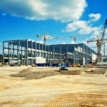 A construction site requiring portable restroom trailers