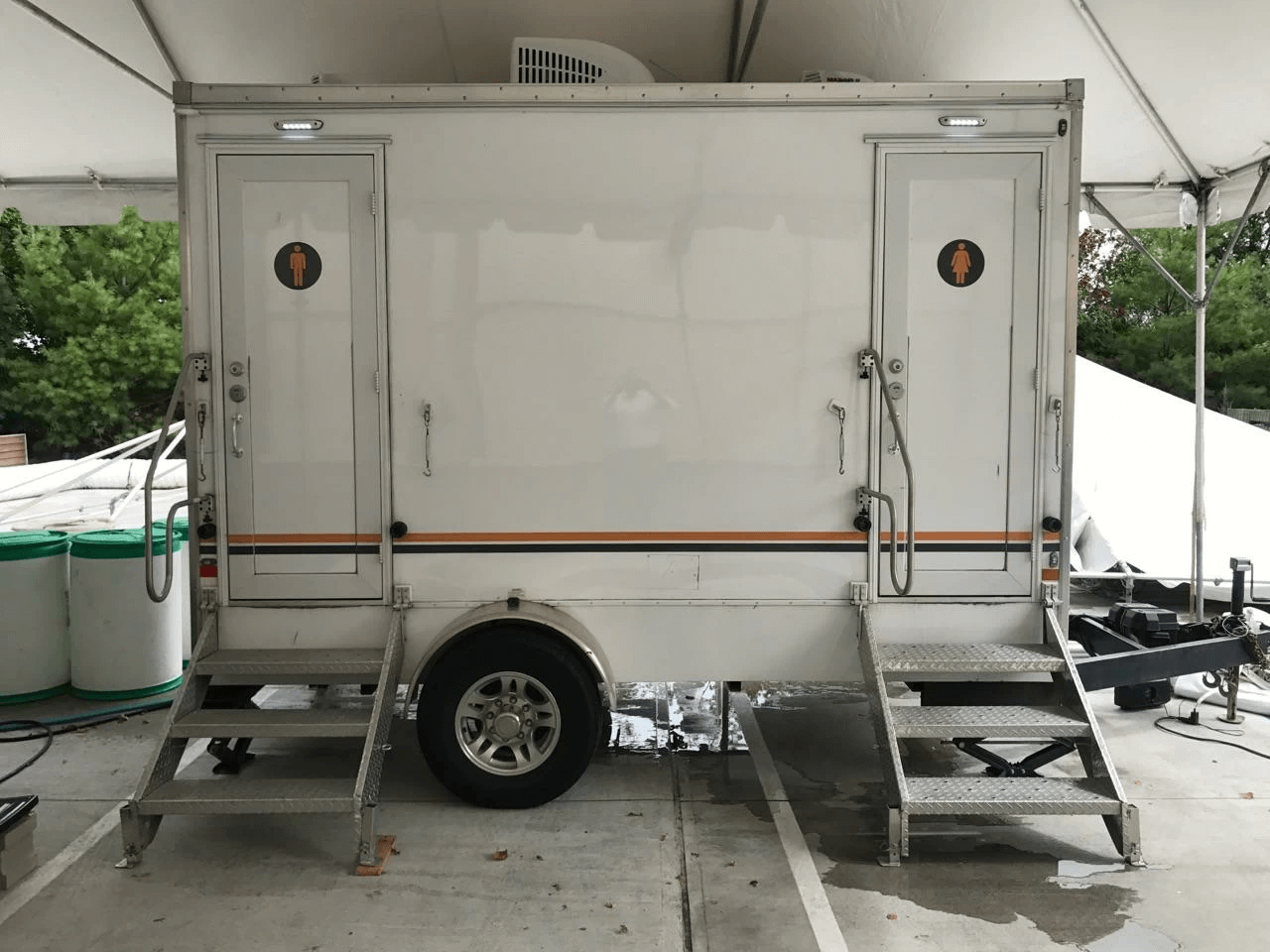 portable restroom by VIP To Go parked outdoors