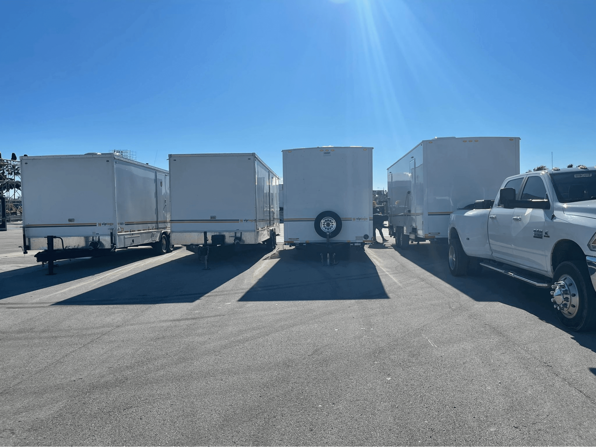 portable shower solutions parked next to each other