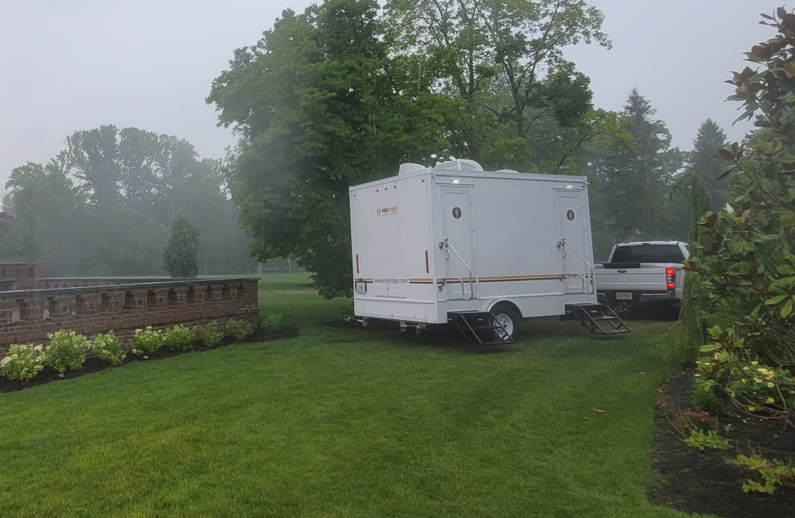 Air conditioned porta potty at a backyard event
