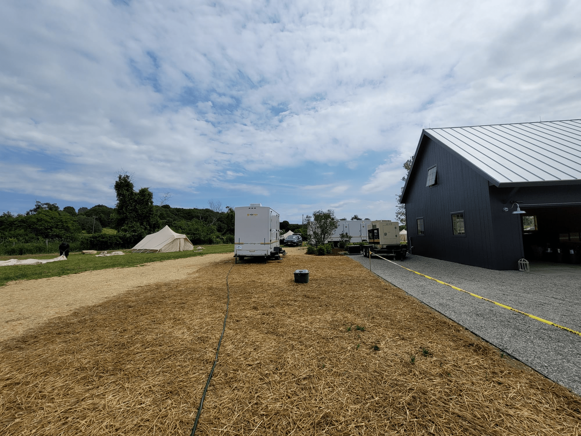 Restroom trailers at a public event held in a ranch