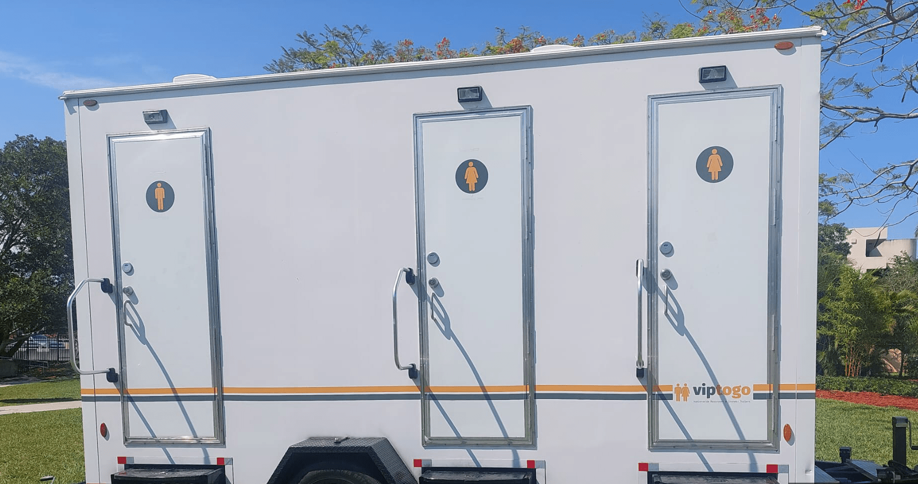 VIP To Go’s standard porta potty at an outdoor event VIP To Go’s standard porta potty at an outdoor event