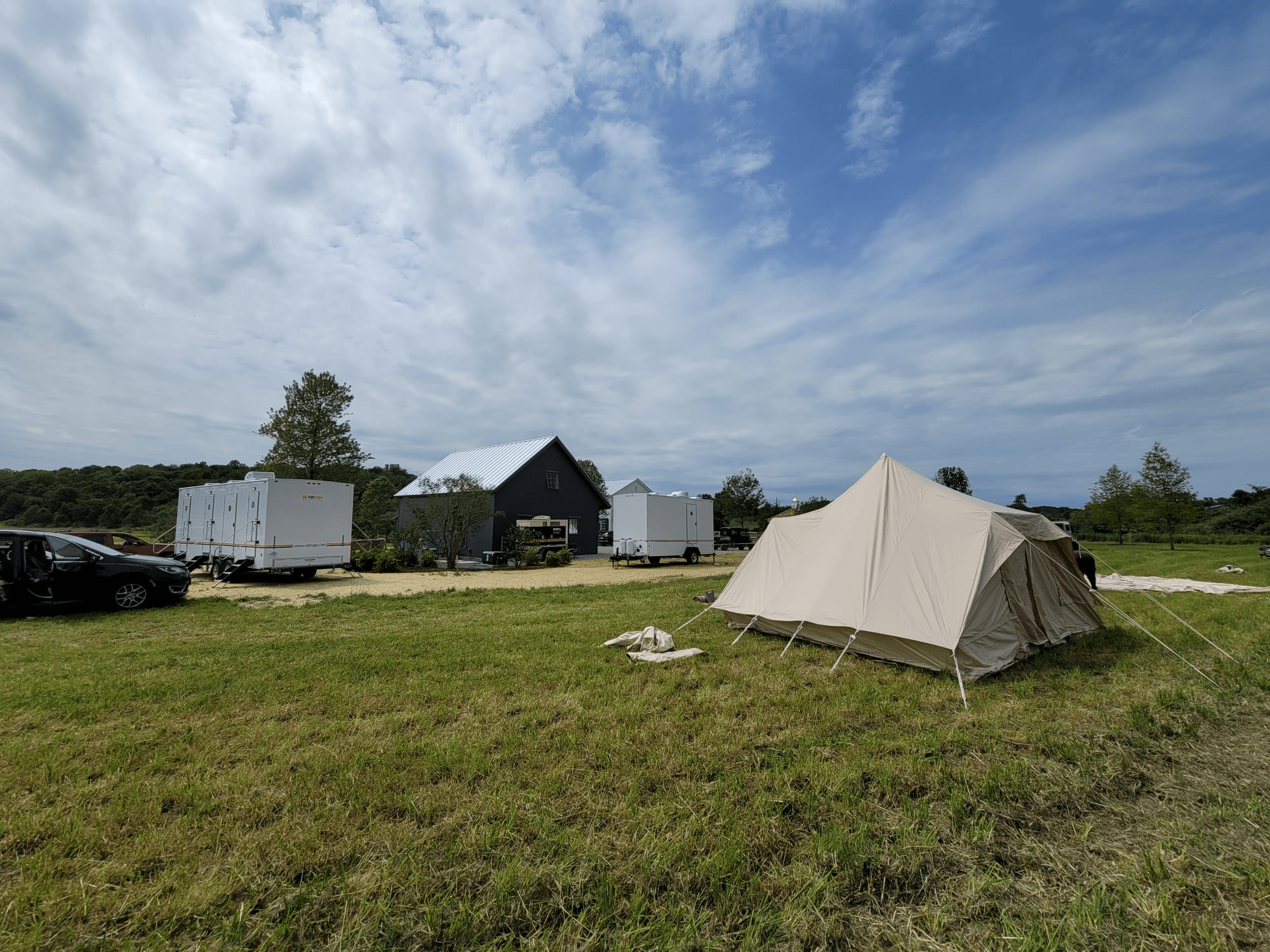 luxury restroom trailers positioned at an outdoor event