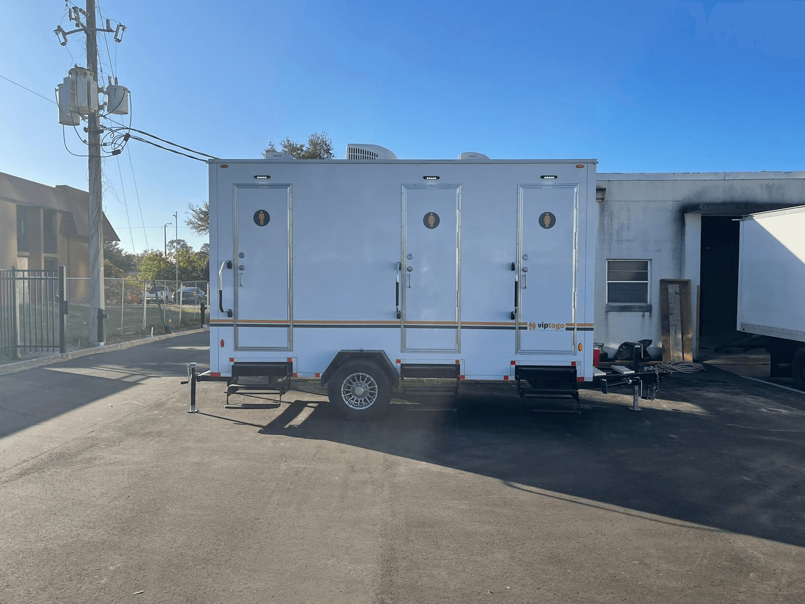 mobile restroom trailer at an outdoor event