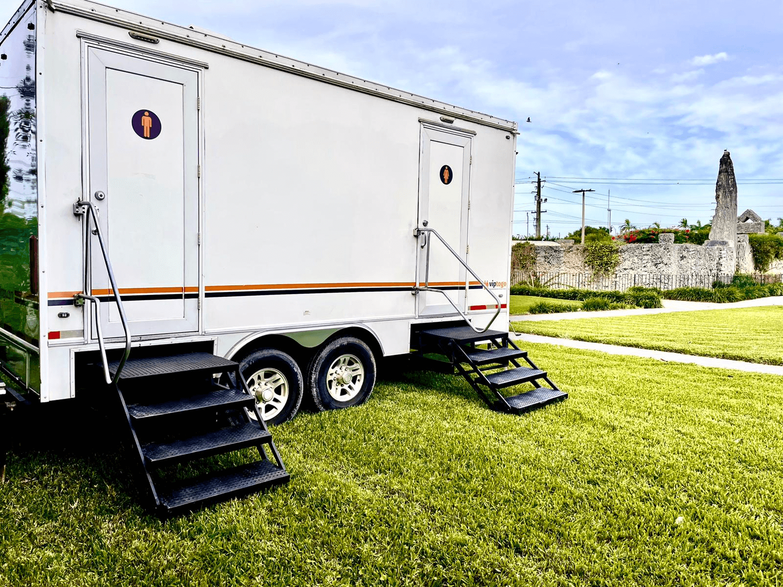 mobile restroom trailer at an outdoor public event