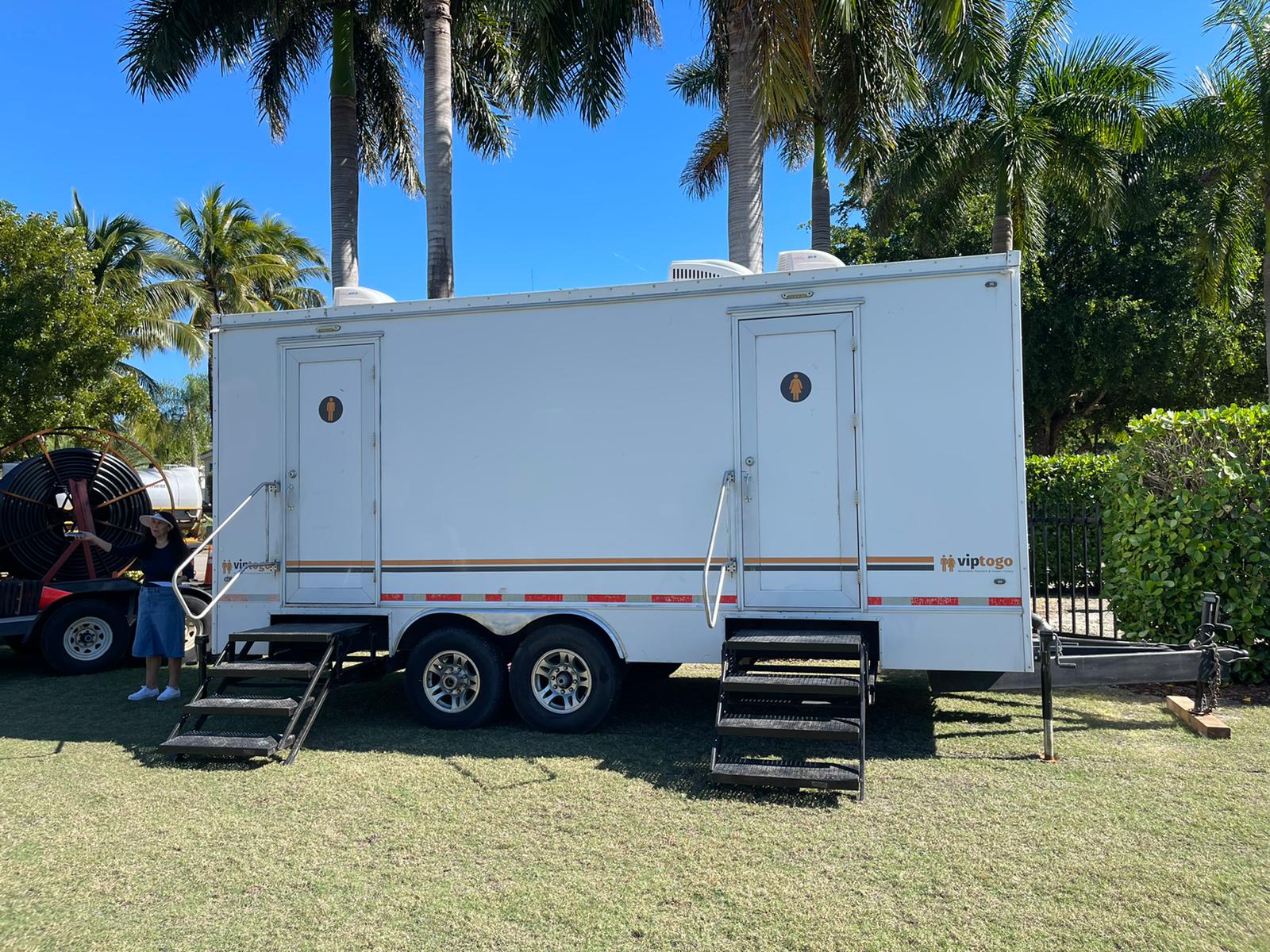 Outdoor restroom trailers for wedding reception