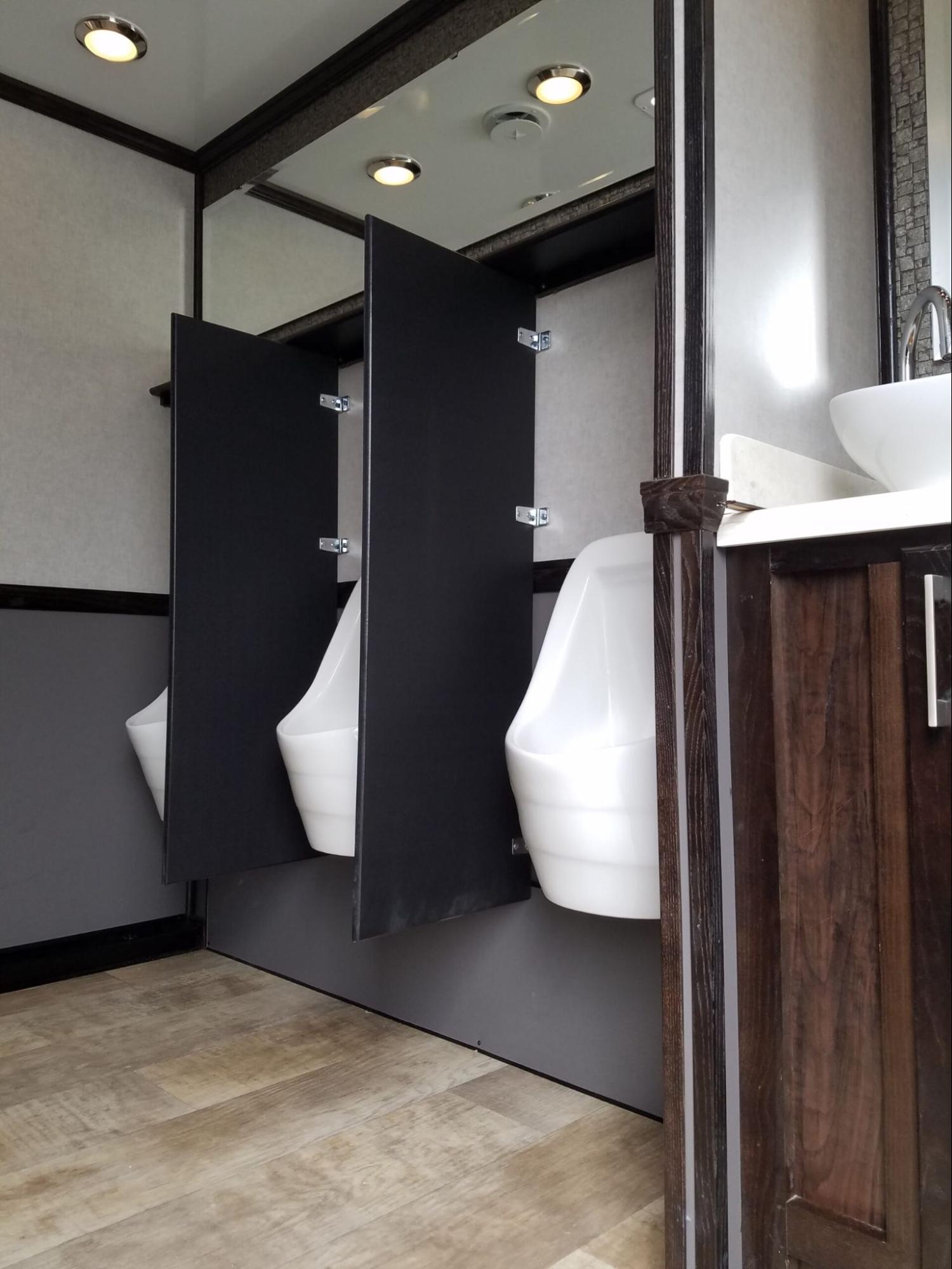 VIP To Go’s portable toilet trailer for outdoor weddings VIP To Go’s portable toilet trailer for outdoor weddings