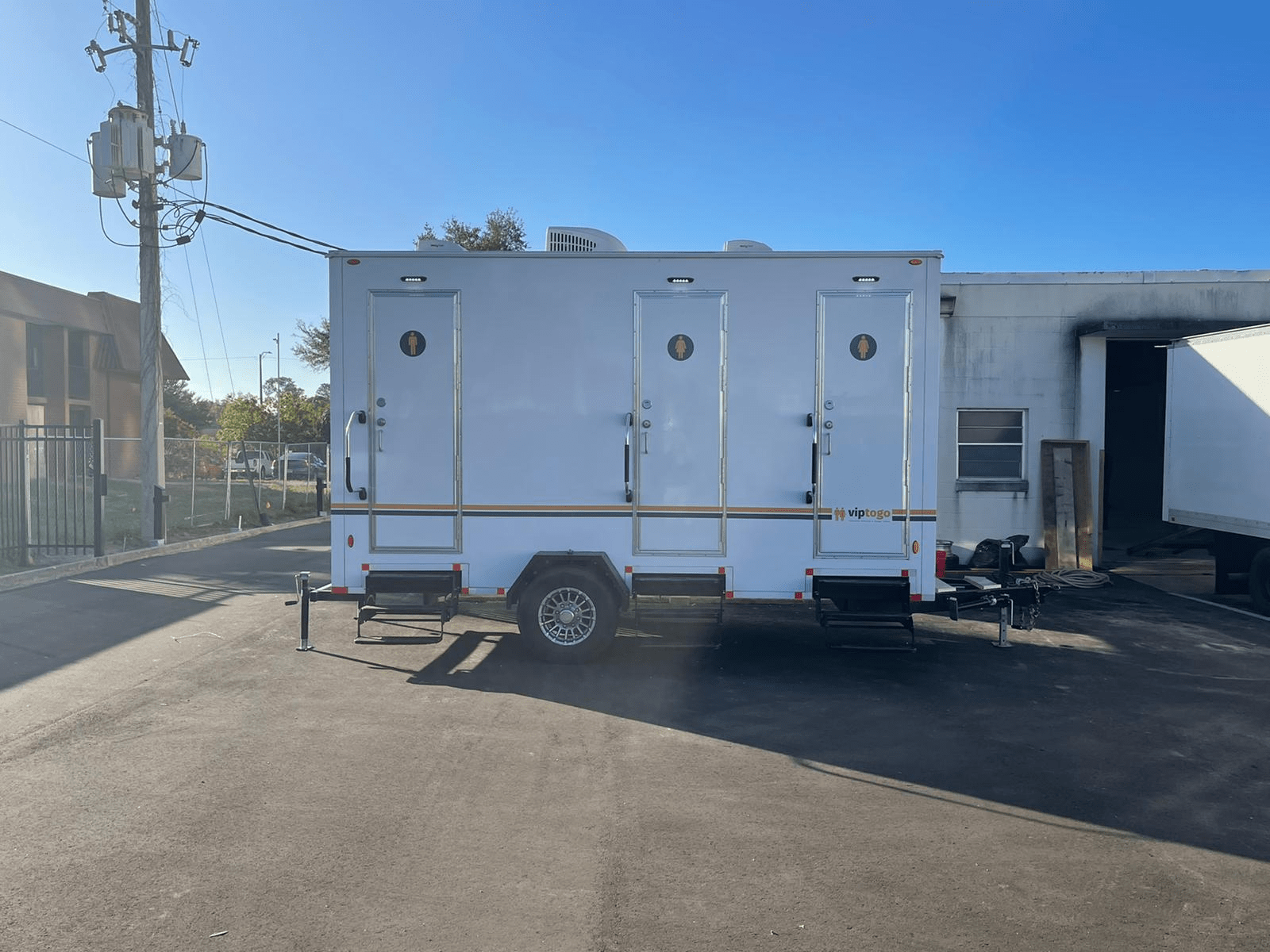 Emergency response restroom trailer at a site