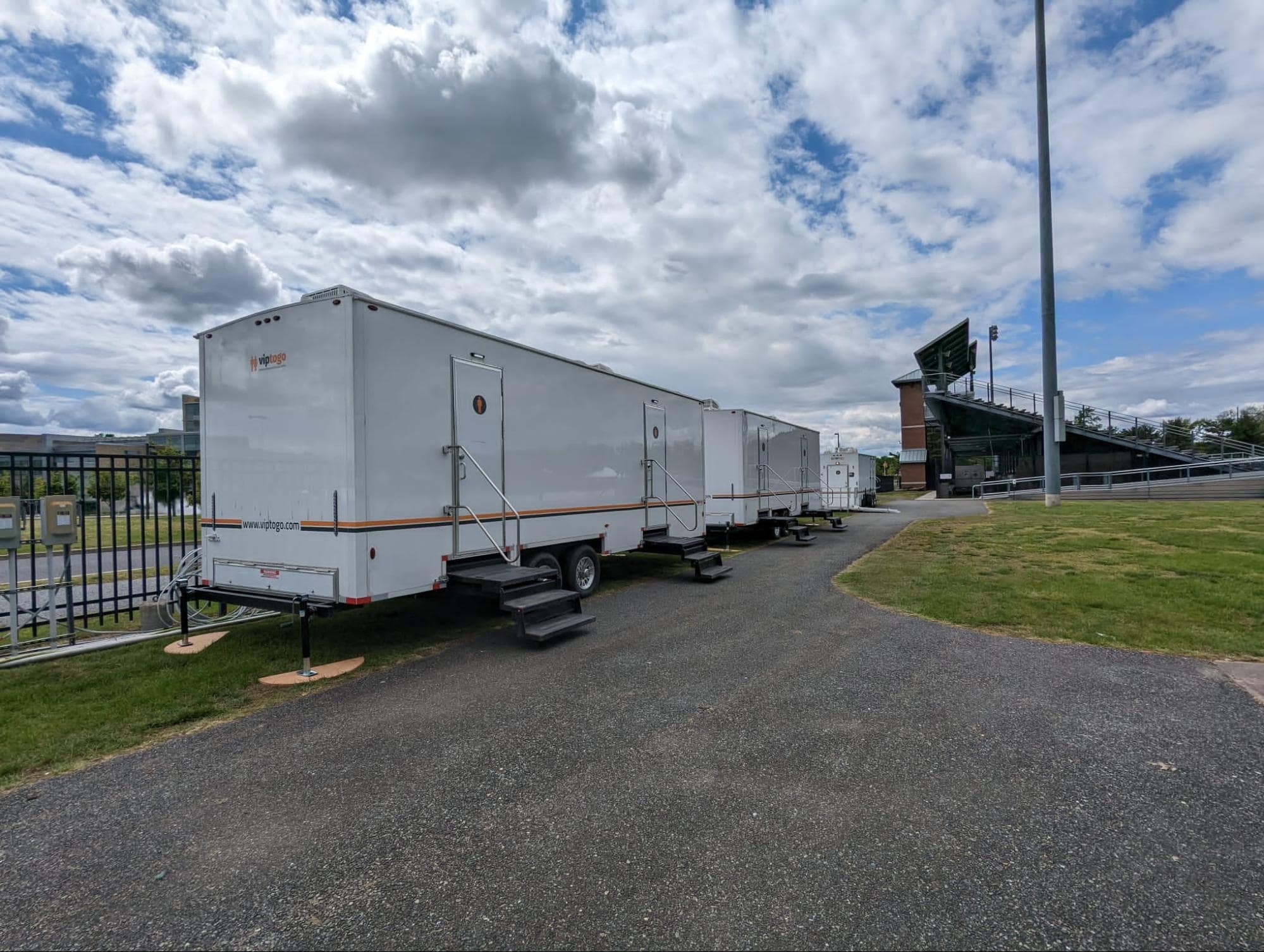 VIP To Go premium restroom rental trailer features at an outdoor event