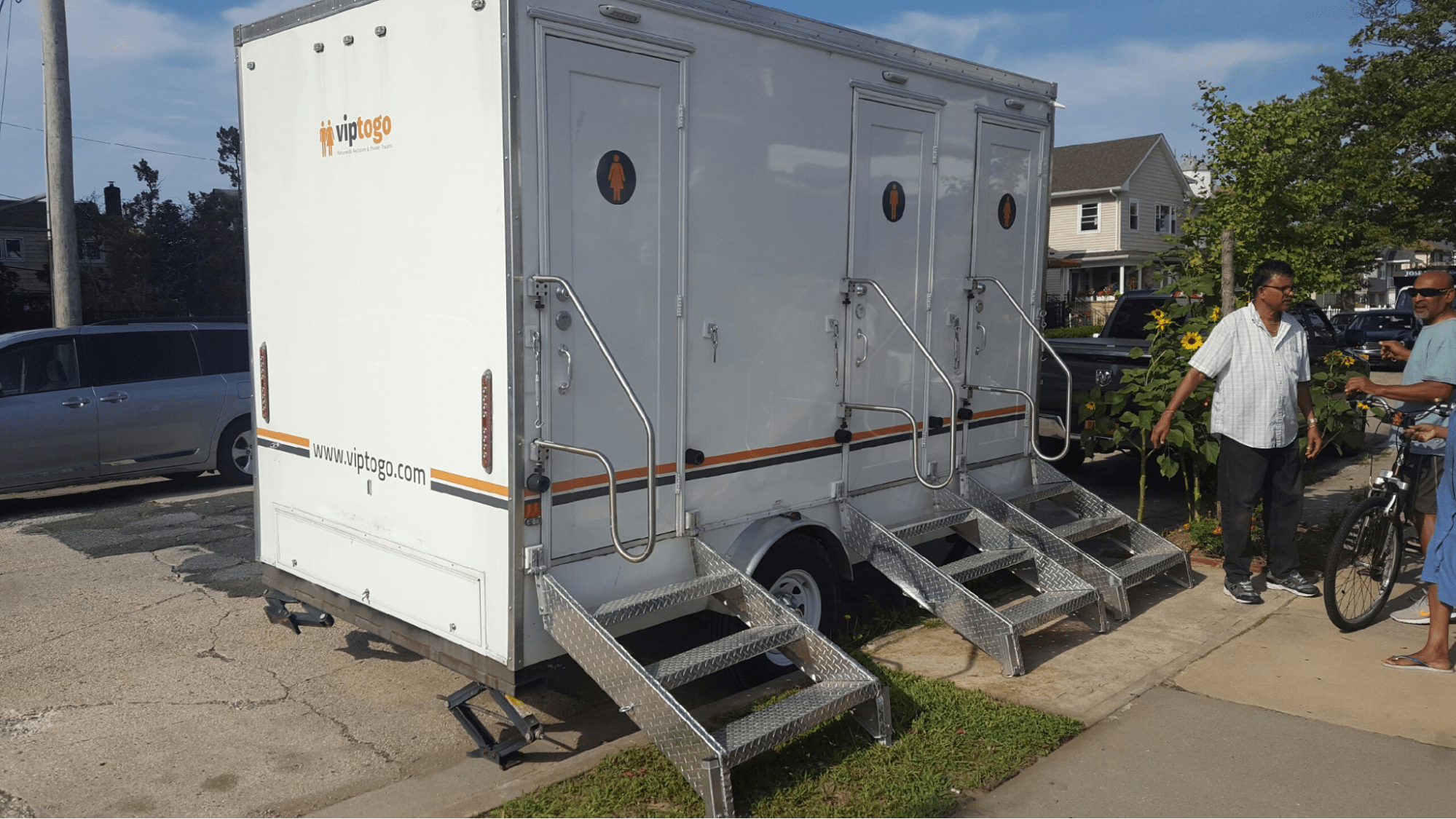 VIP To Go’s three station restroom trailer size at an outdoor event VIP To Go’s three station restroom trailer size at an outdoor event