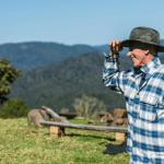 A farmer on a setting that needs farm portable restrooms