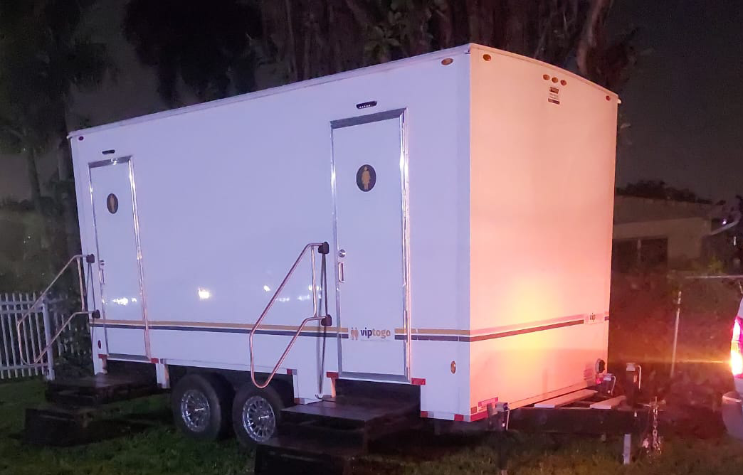 portable restroom trailer rental for Jersey City, New Jersey nighttime event