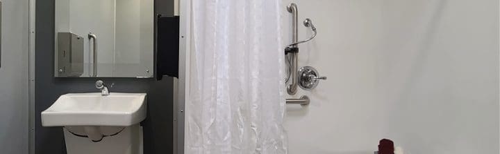 Interior view of ADA single restroom shower trailer combo