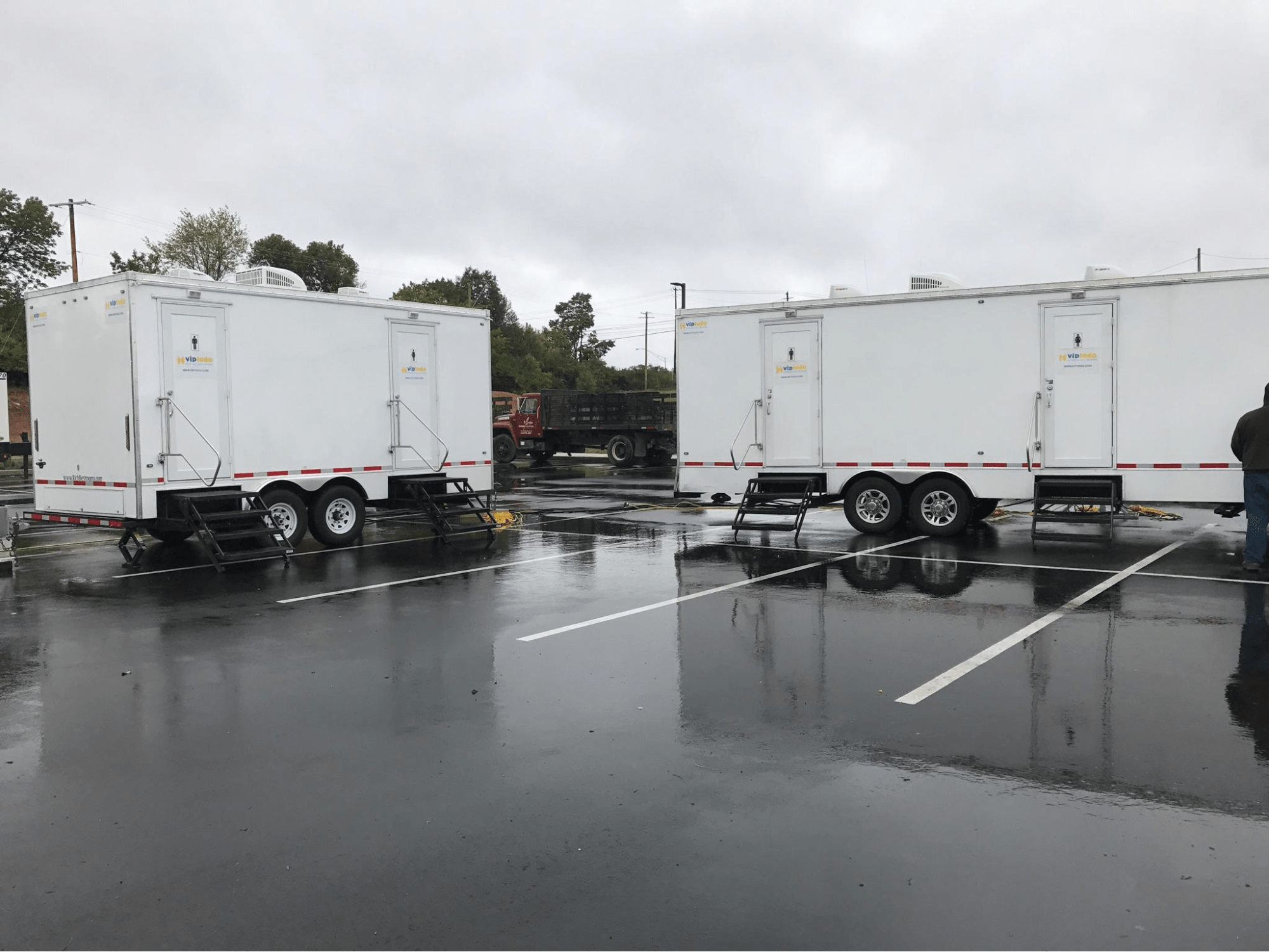 Several VIP To Go portable restroom trailers for festivals Several VIP To Go portable restroom trailers for festivals